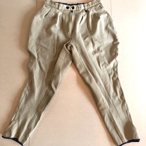 Tan Equilibre breeches full seat. Size 30. Good used condition.